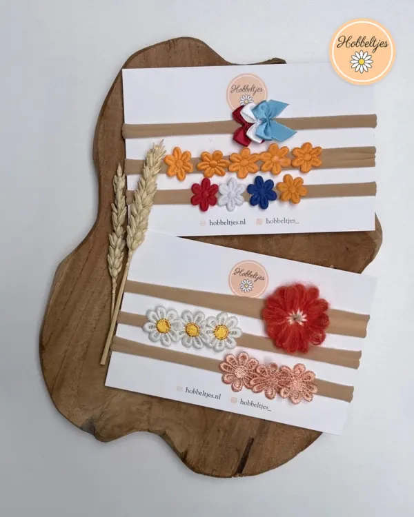 Baby-Haarbänder in Rot, Weiß, Blau und Orange mit Schleifchen