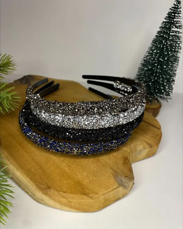 Stapel van vier glinsterende strass haarbanden